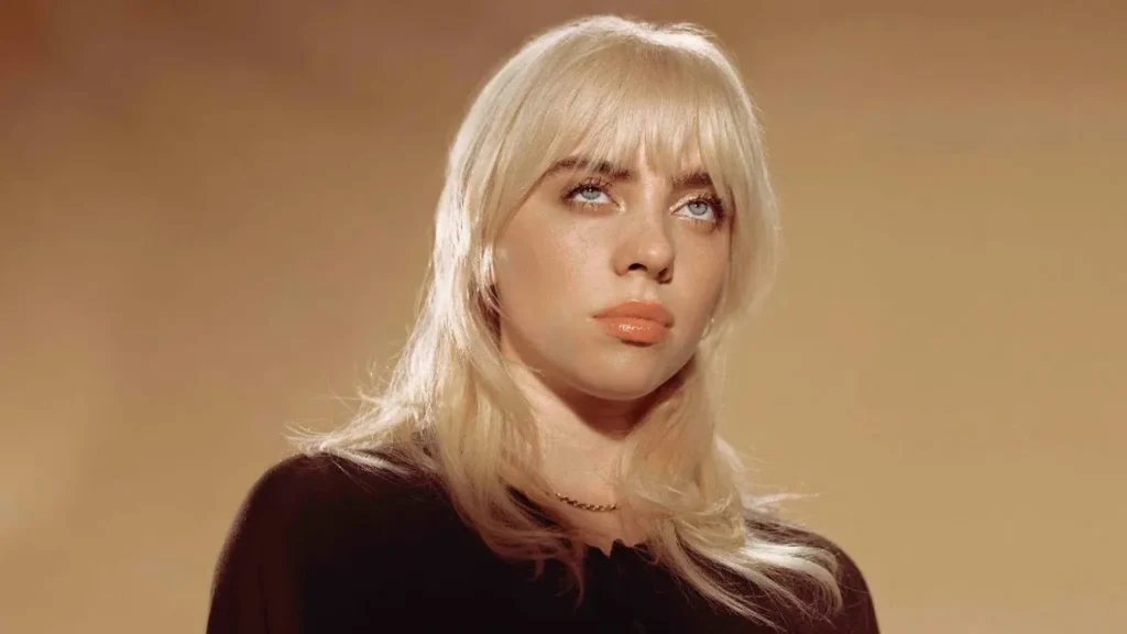 “Infographic of Billie Eilish’s 2026 complete biography, top albums, hit songs, major awards, career timeline, net worth, and fun facts.”